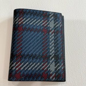 New Coach Passport Covers
